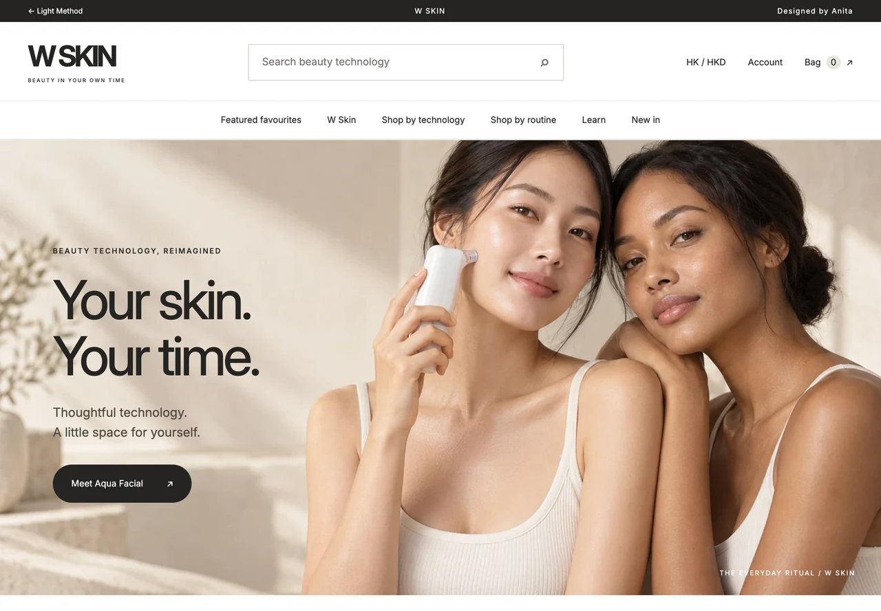 W Skin beauty technology website with original campaign photography and warm neutral editorial design